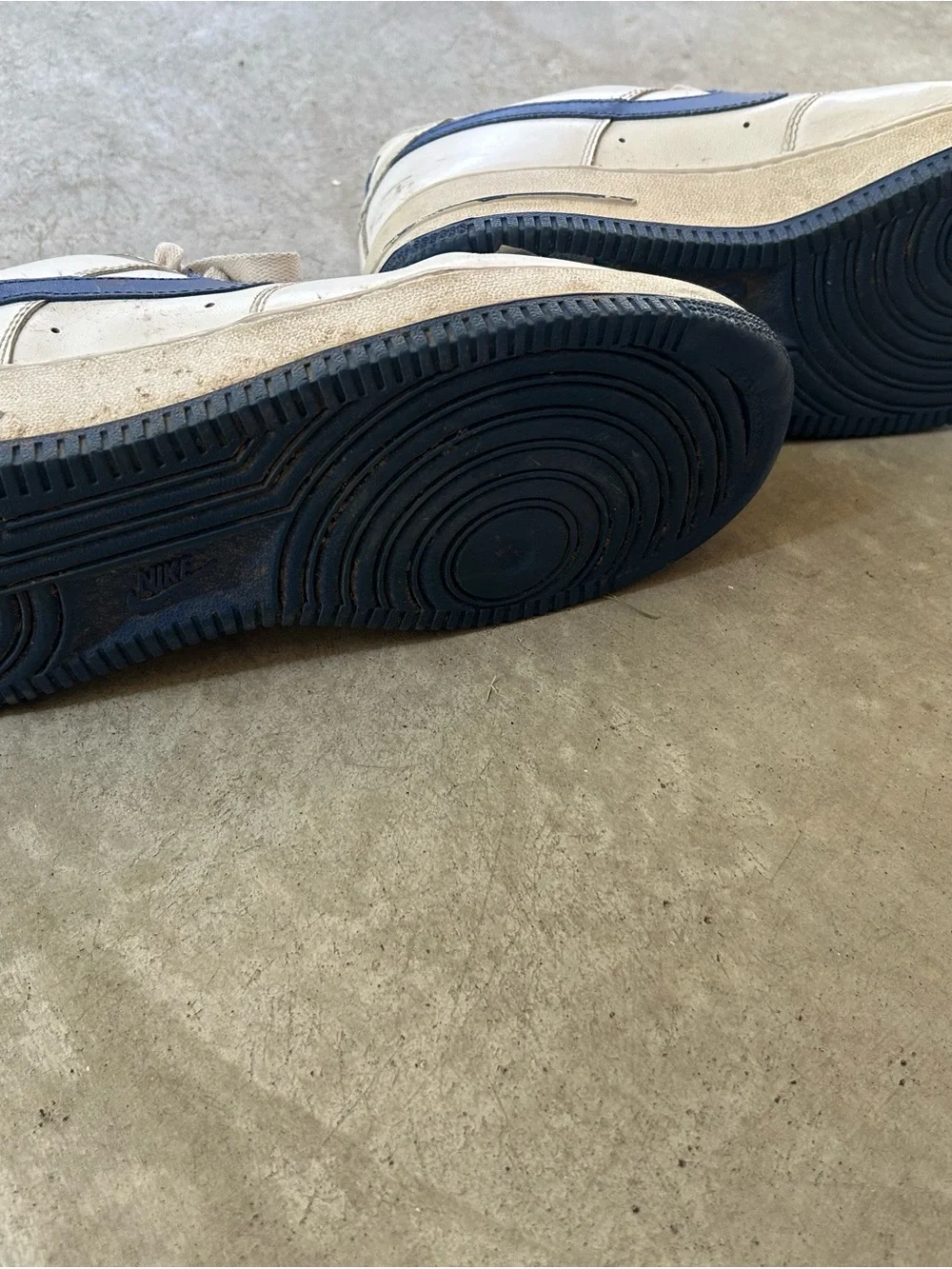 Nike White Sneakers with Blue Swoosh